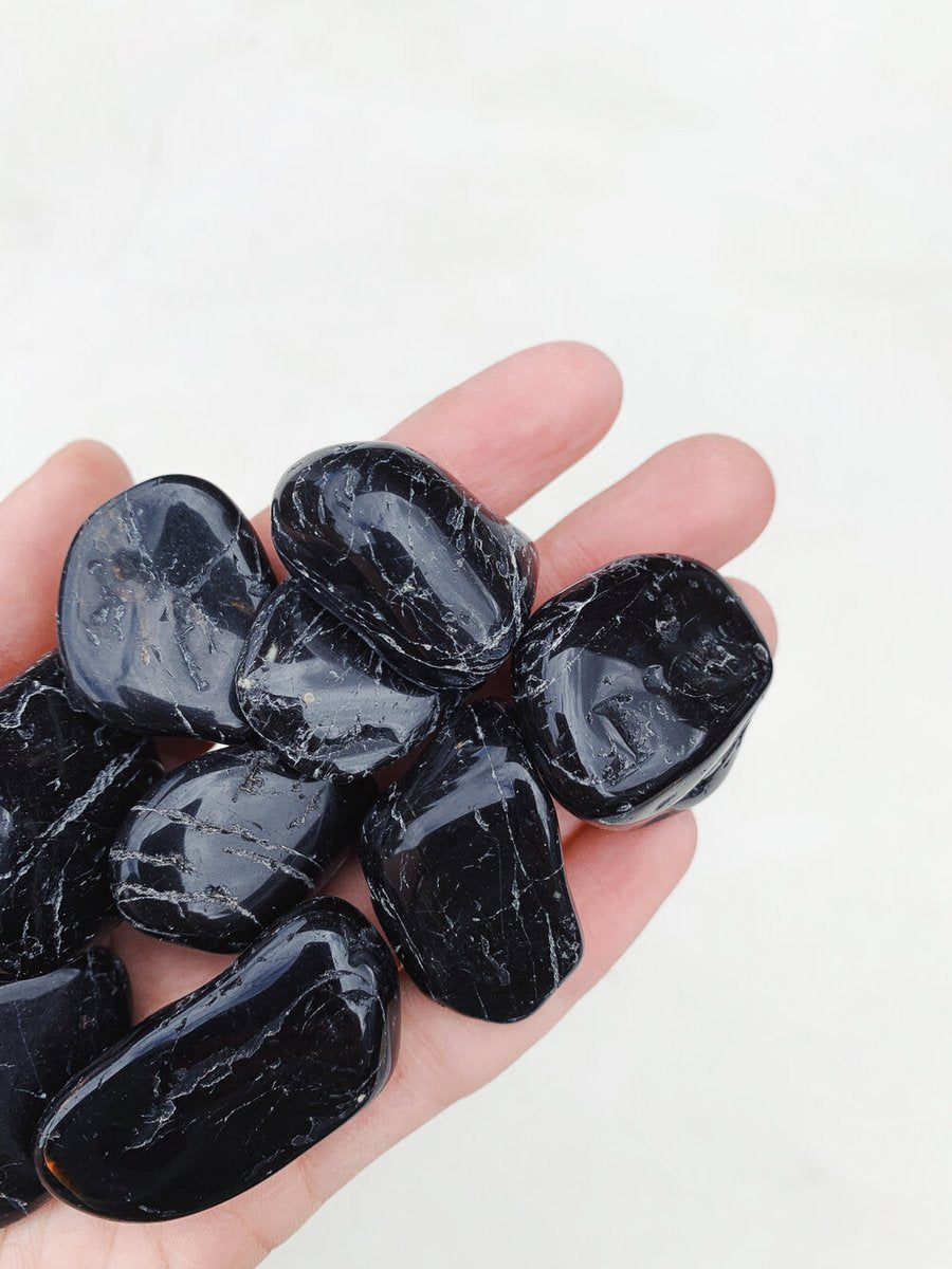 CLEANSE & CO. Black Tourmaline. Ethically Sourced Tumbled Crystal.