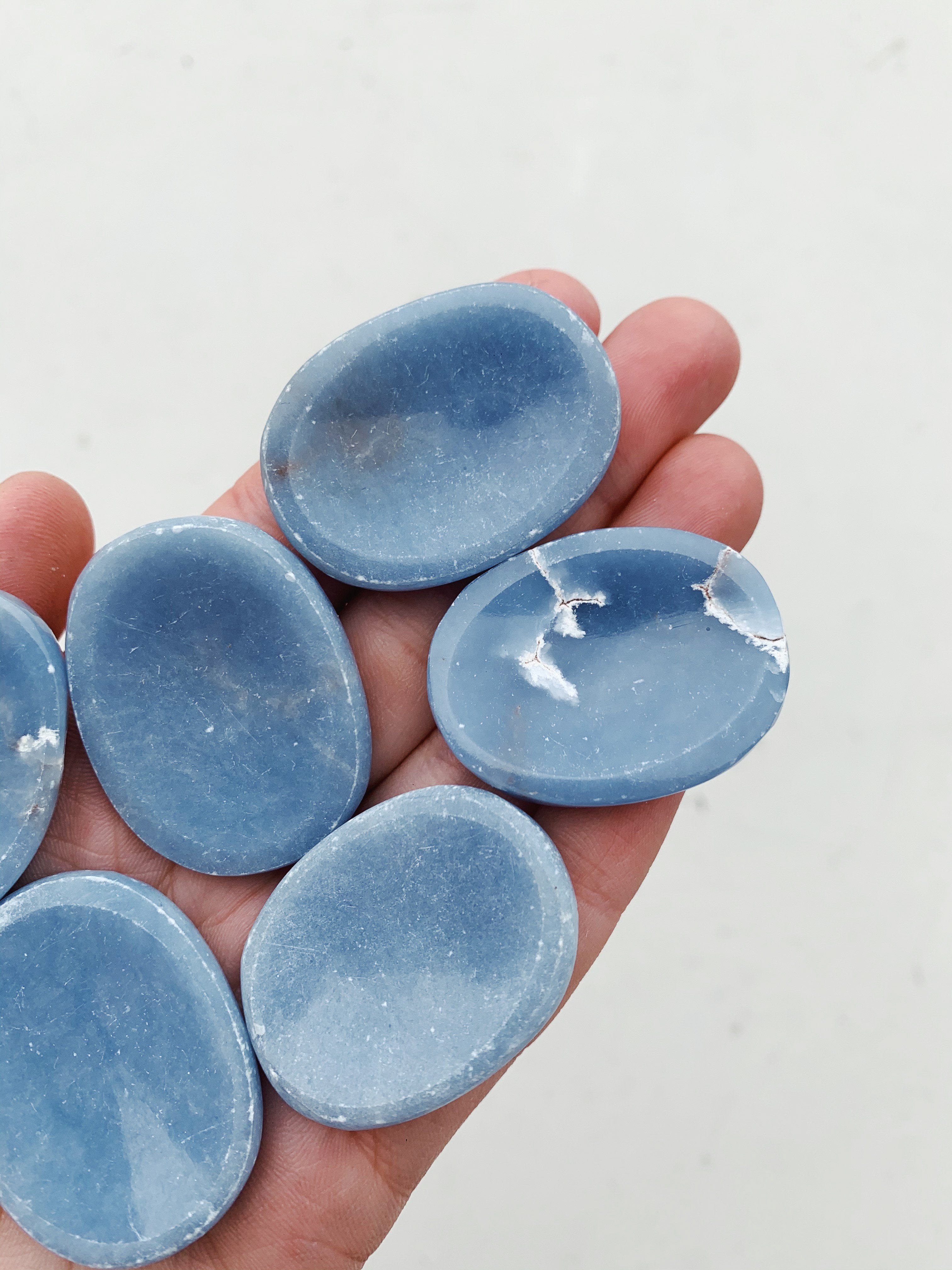 CLEANSE & CO. Angelite Crystal Worry Stone. Ethically Sourced Crystals.