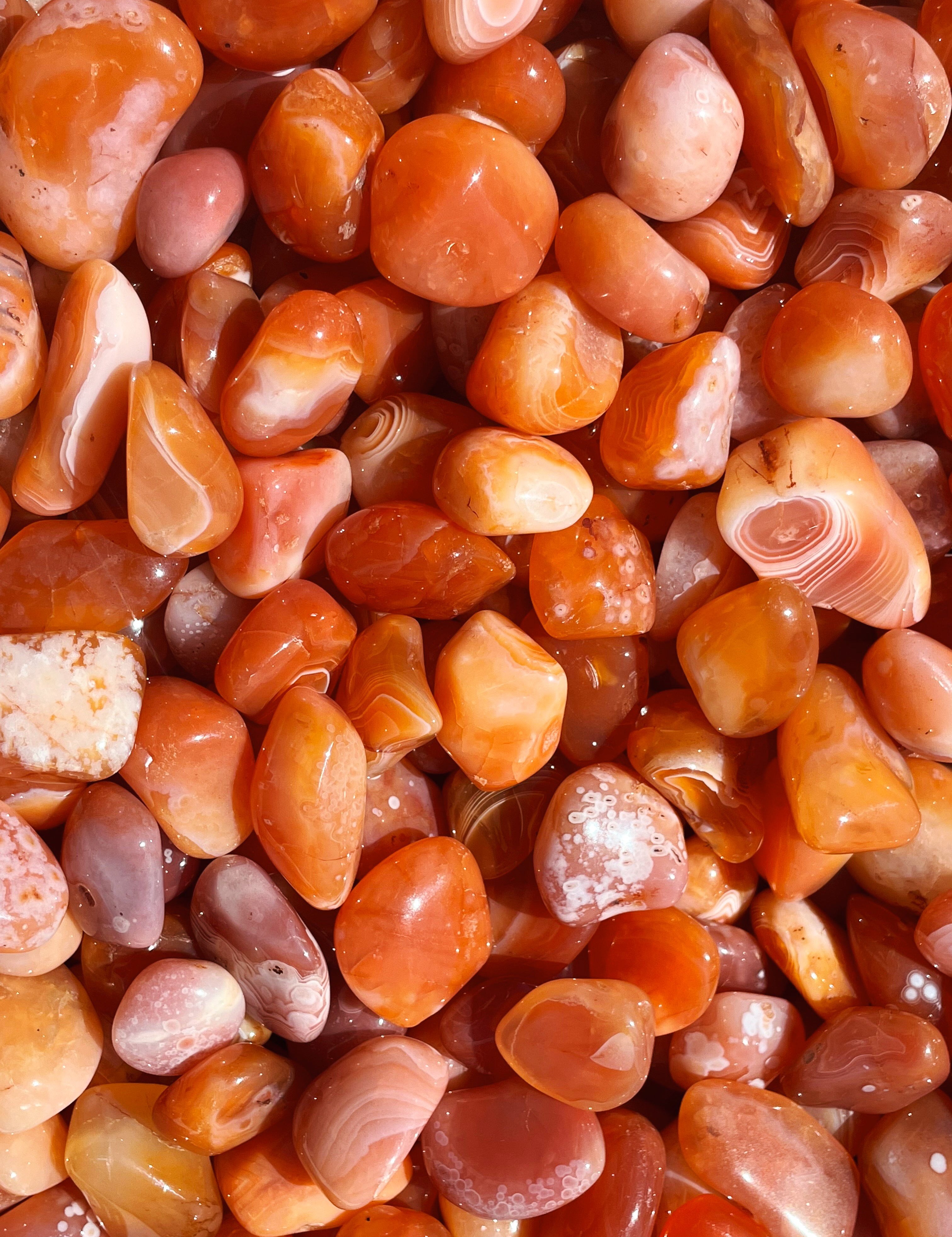 CLEANSE & CO. Banded Carnelian. Ethically Sourced Tumbled Crystal.