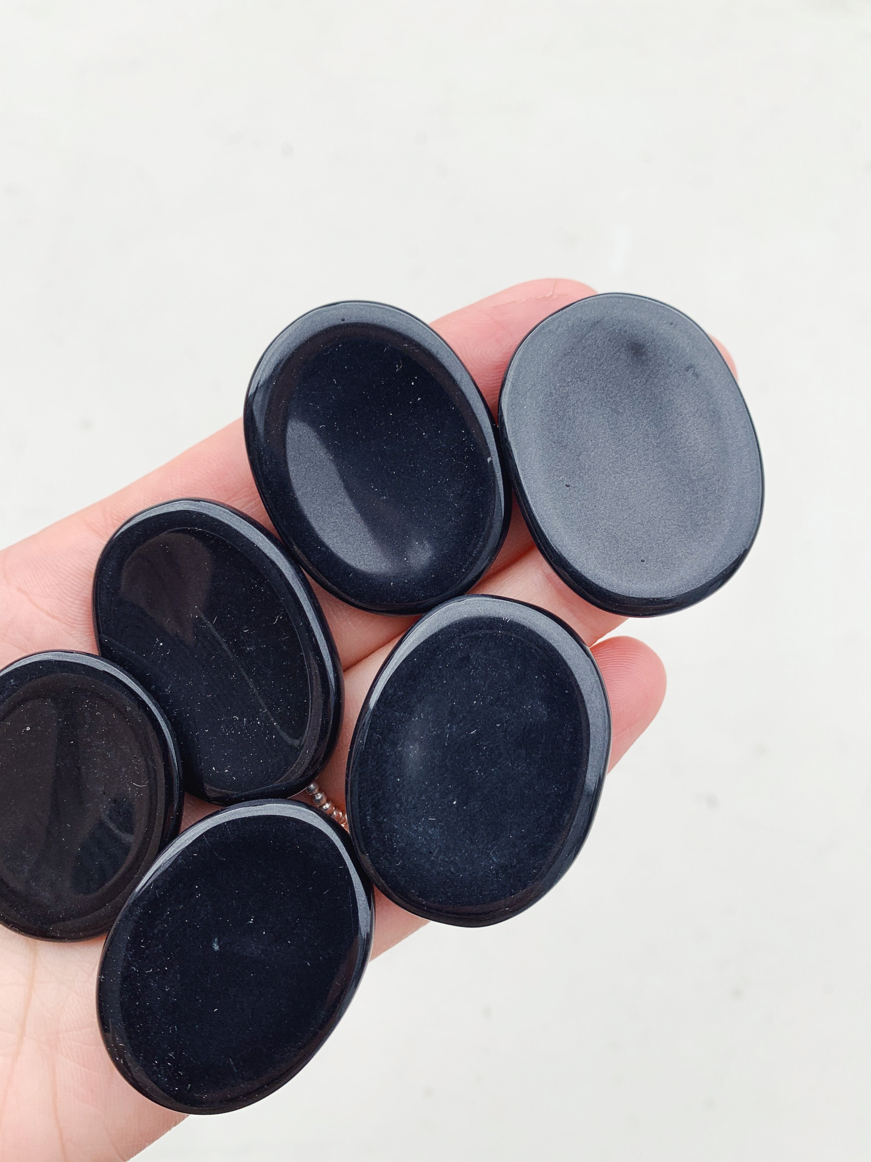 CLEANSE & CO. Black Obsidian Worry Stone. Ethically Sourced Crystals.
