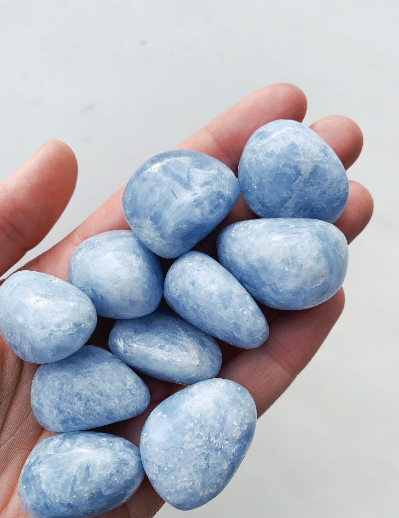 CLEANSE & CO. Blue Calcite. Ethically Sourced Tumbled Crystal.