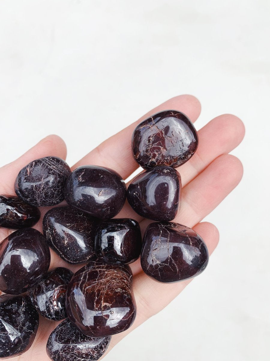 CLEANSE & CO. Garnet. Ethically Sourced Tumbled Crystal.