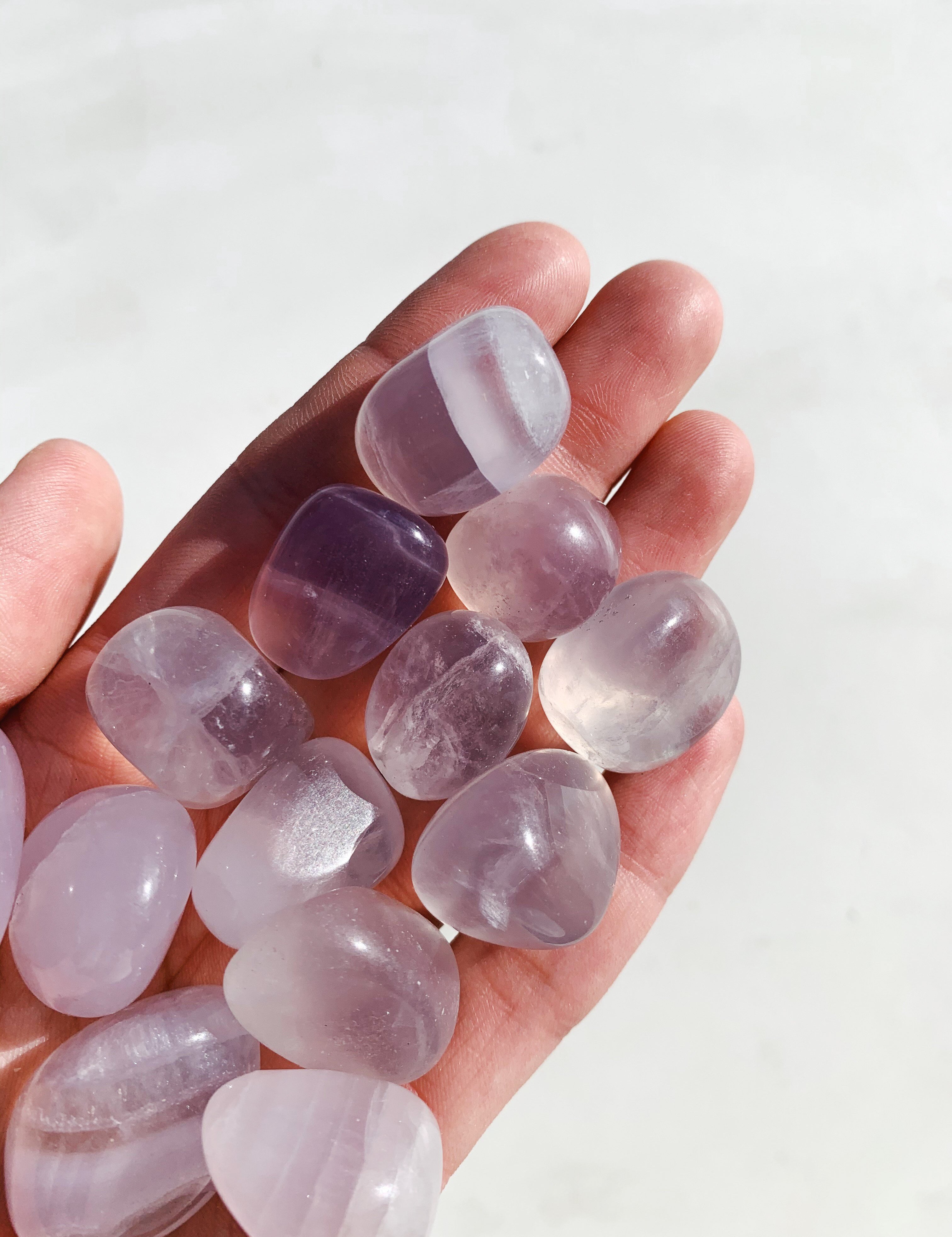 CLEANSE & CO. Lavender Fluorite. Ethically Sourced Tumbled Crystal.