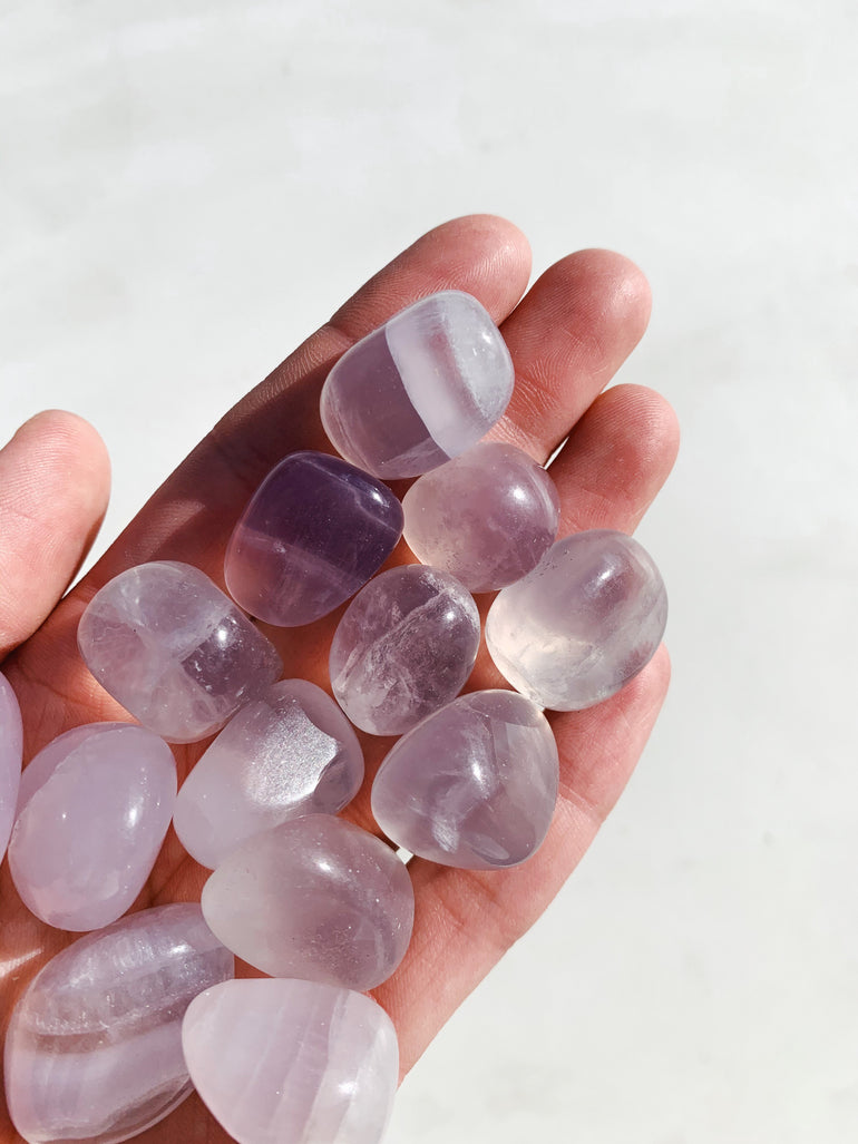CLEANSE & CO. Lavender Fluorite. Ethically Sourced Tumbled Crystal.