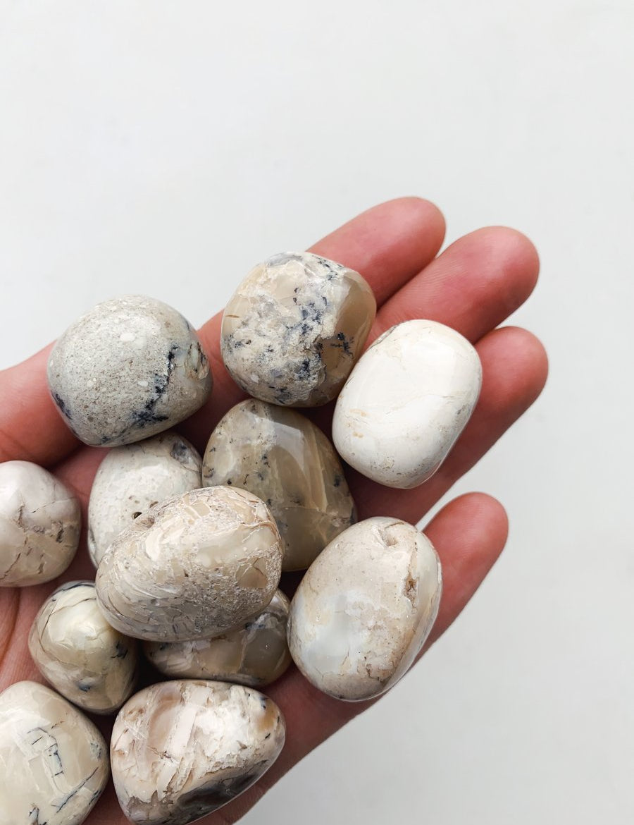 CLEANSE & CO. Opal Ivory. Ethically Sourced Tumbled Crystal.