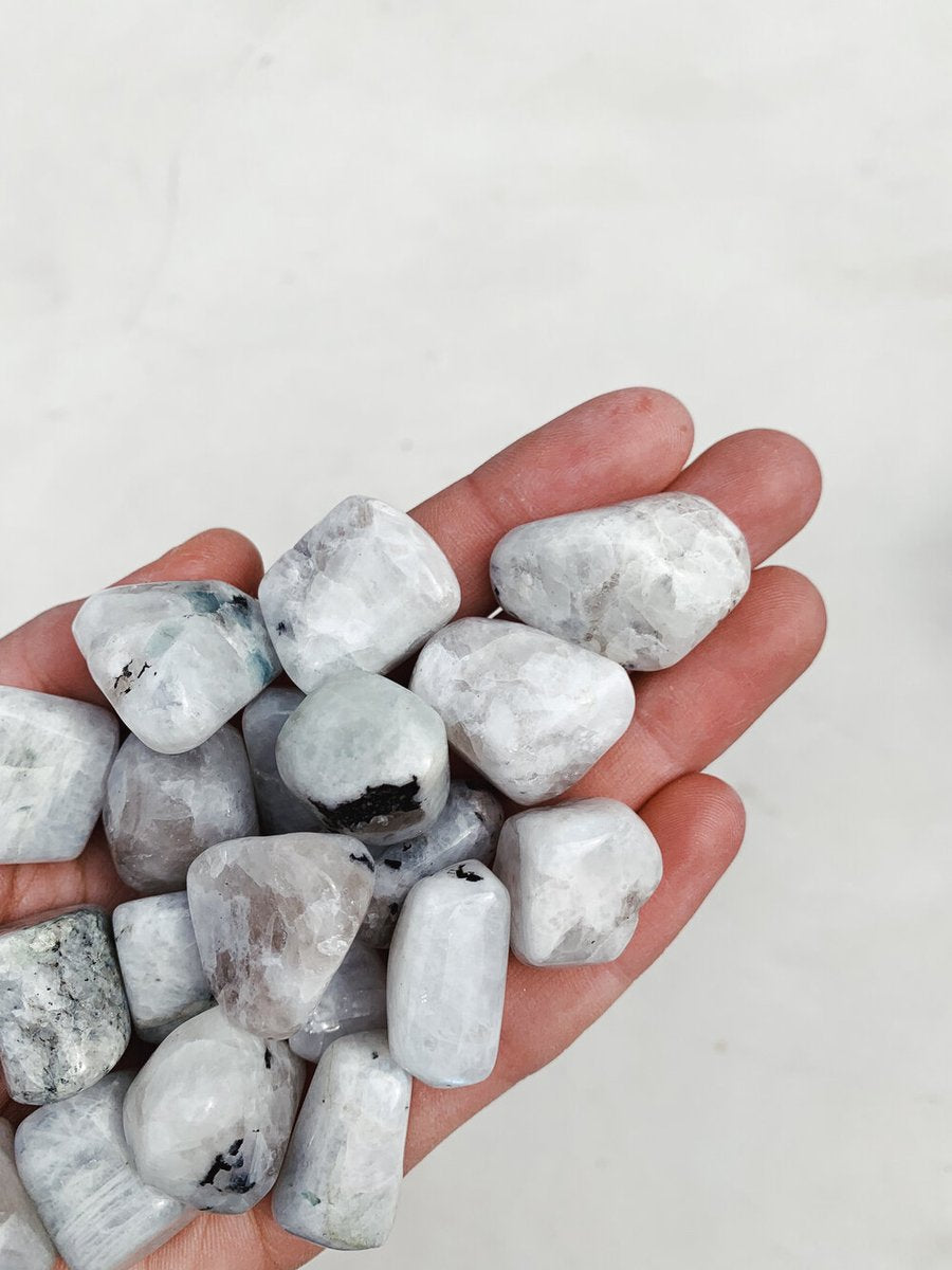 CLEANSE & CO. Rainbow Moonstone. Ethically Sourced Tumbled Crystal.