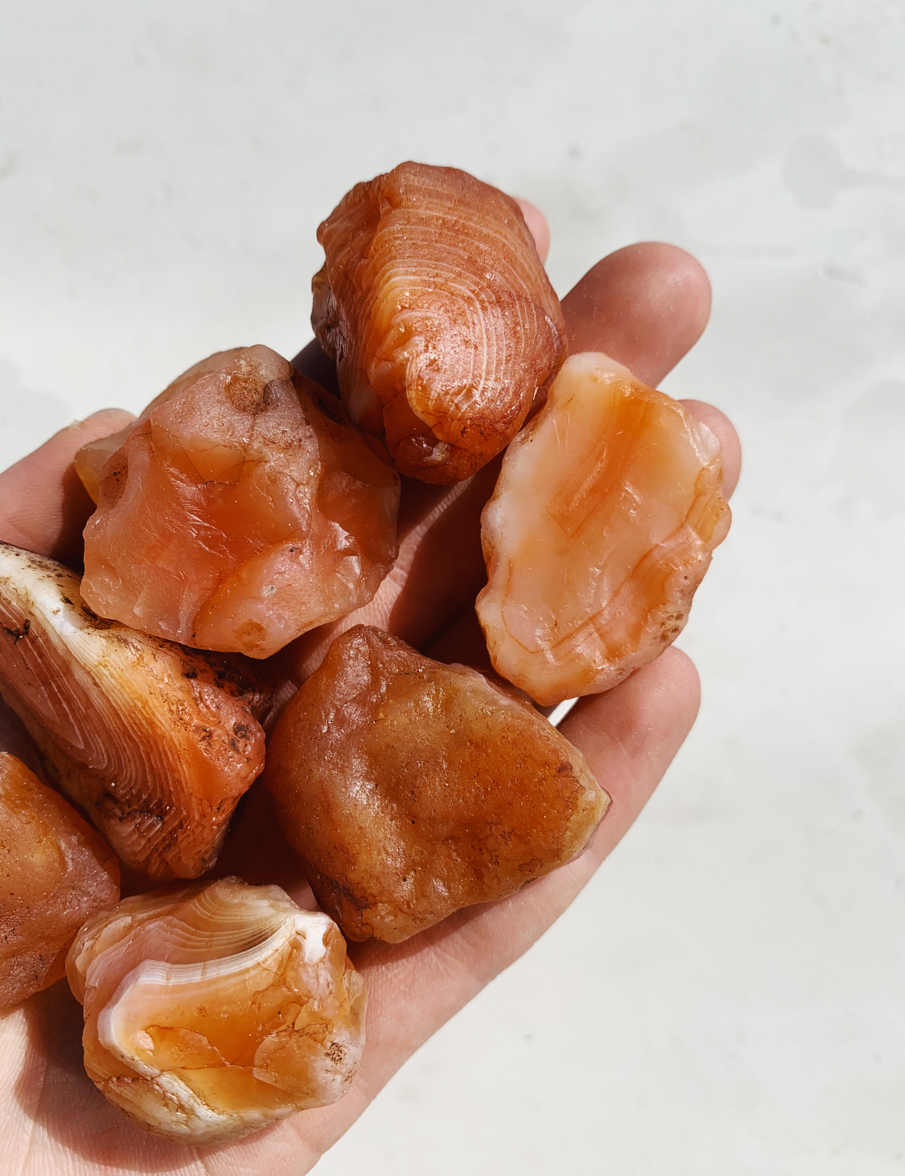 CLEANSE & CO. Small Raw Banded Carnelian. Ethically Sourced Raw Crystals.