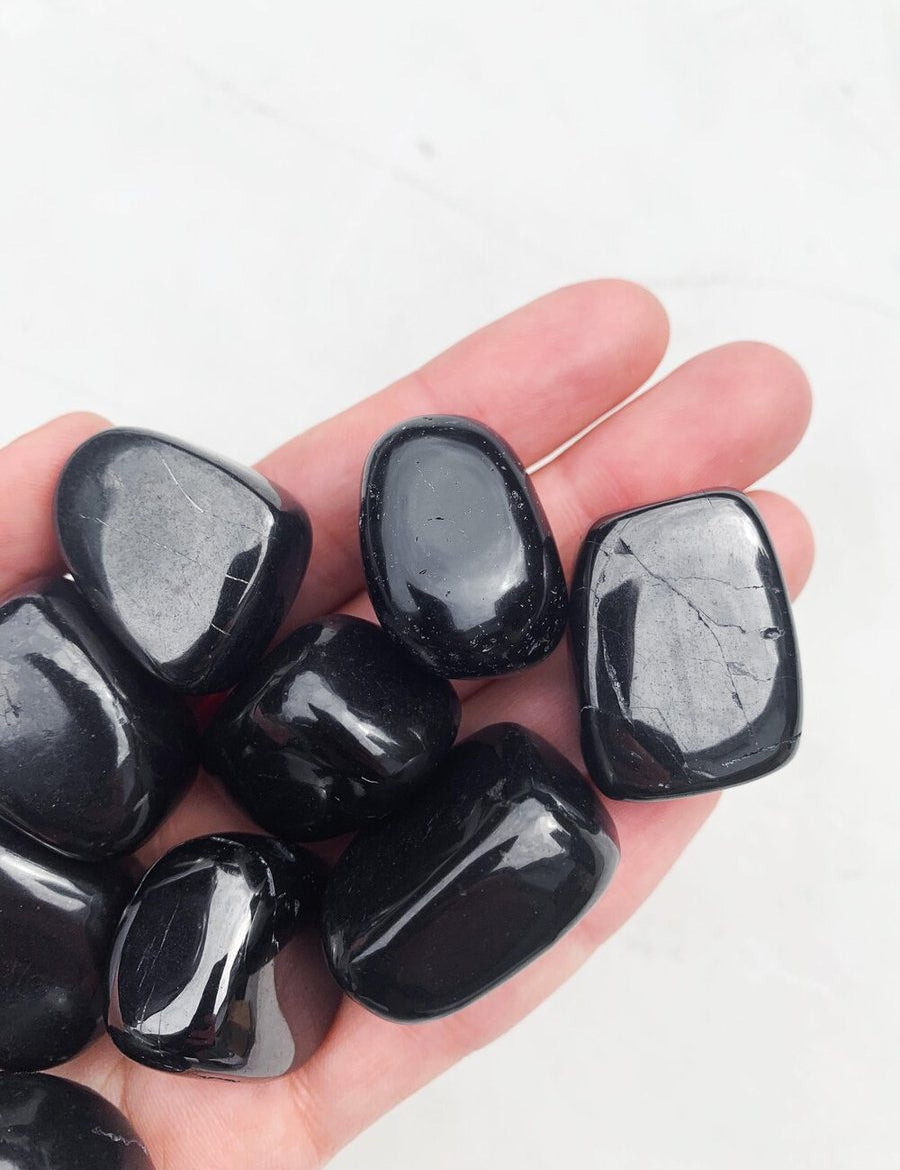CLEANSE & CO. Shungite. Ethically Sourced Tumbled Crystal.