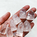 Mini Clear Quartz Tower on palm